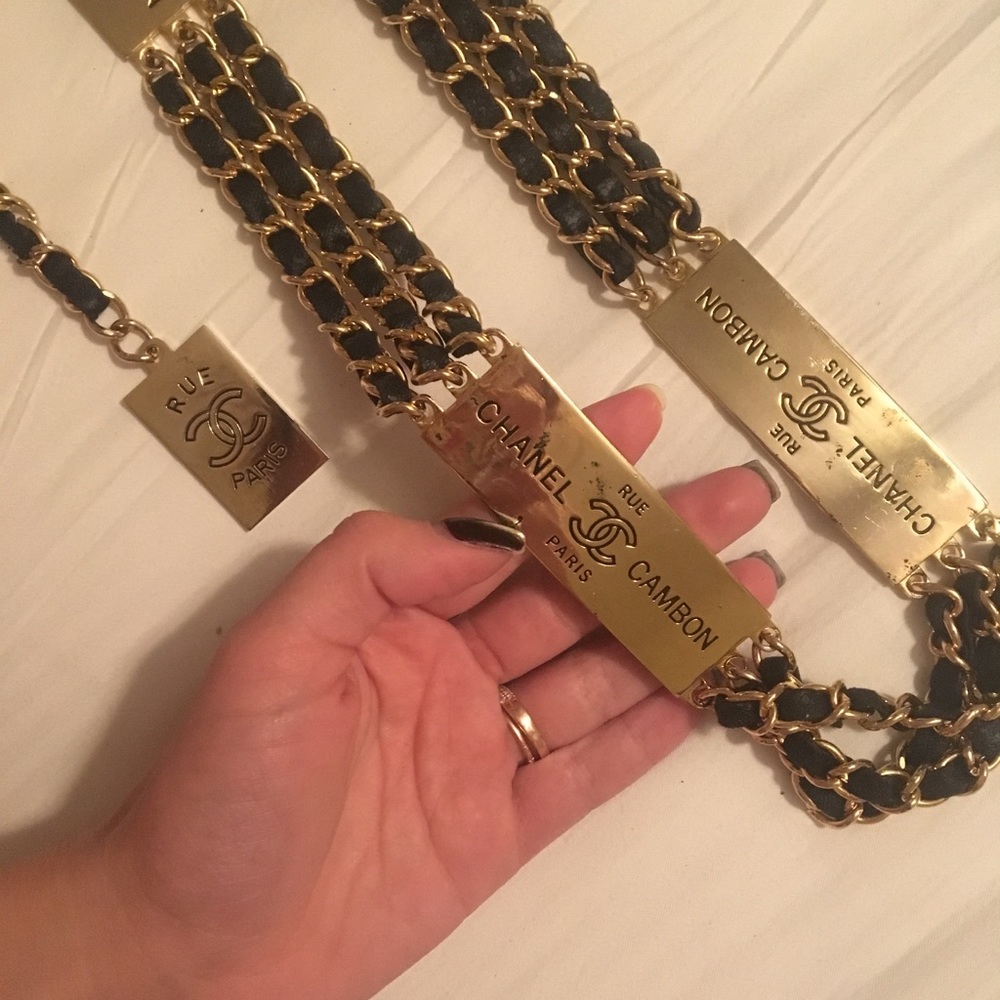 1997 Chanel belt. Gold and black .